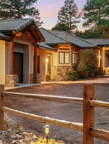 Secluded mountain home with large acreage and pine tree surroundings in Conifer, CO